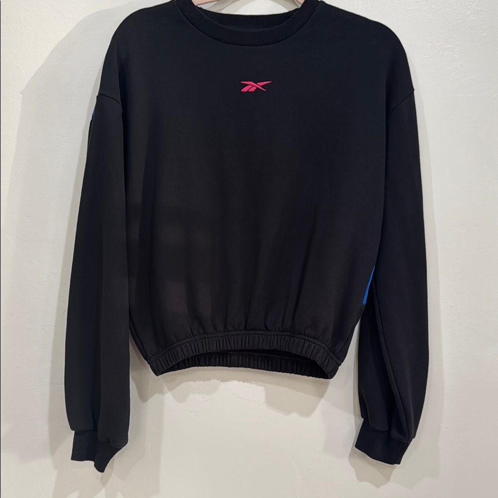 Vintage Reebok Black Crewneck with Pink Emblem and Elastic Bottom